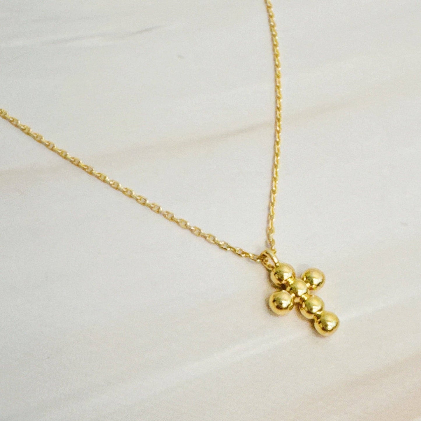 Dot Cross Pendant Necklace
